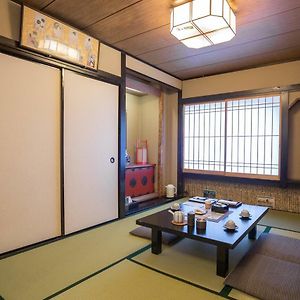 Kamer met Twee Aparte Bedden in Japanse Stijl